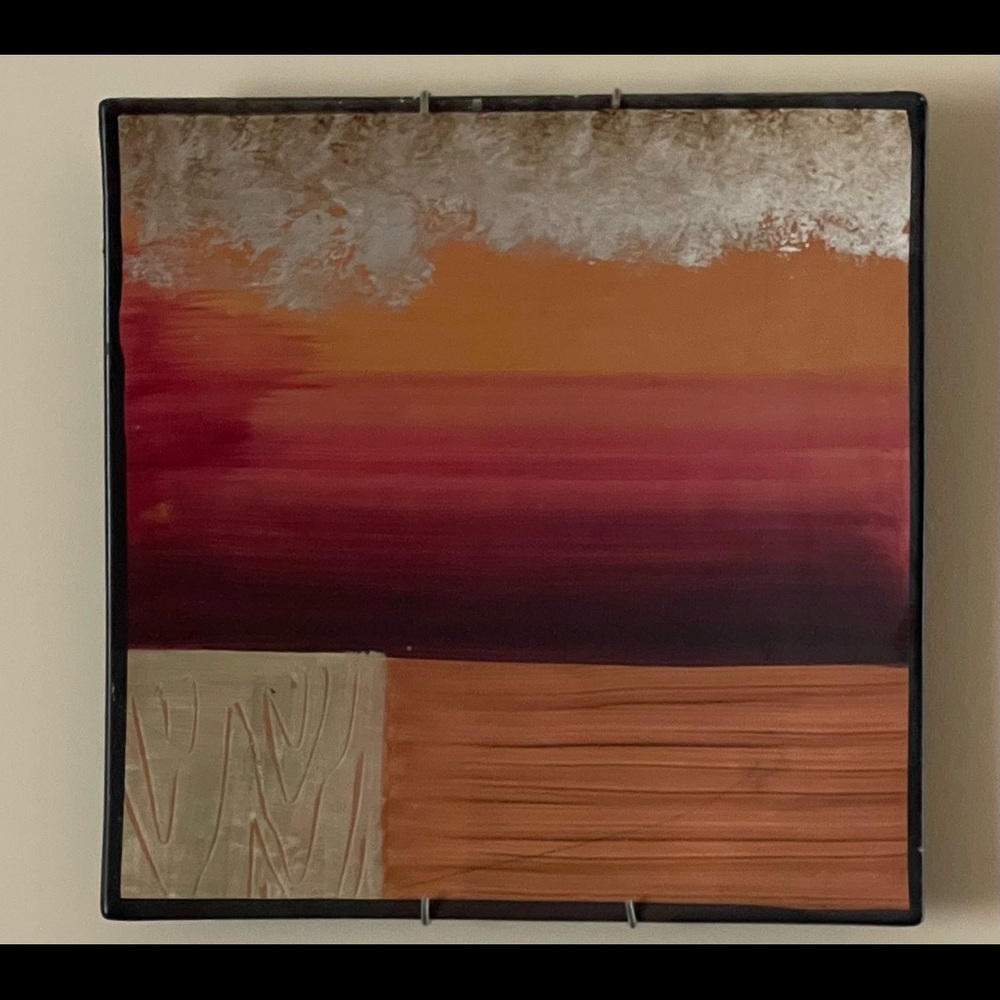 Hanging Wall Art of 2. It is multi colored.